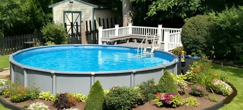 Quality solid above-ground pool cover securely installed on a round pool in a sunny backyard